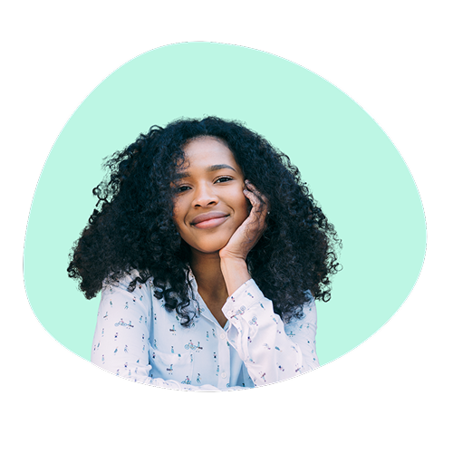 Smiling person resting their chin on their hand